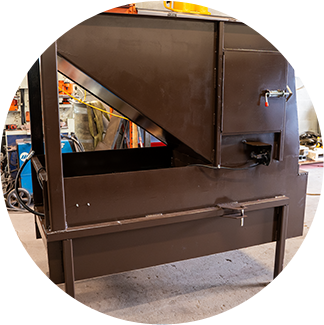 A brown metal cabinet sitting in the middle of a room.